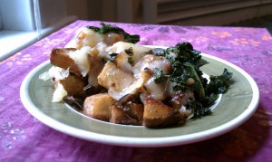 fried potatoes with cheese and kale